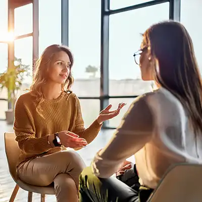 A woman in addiction counselling.