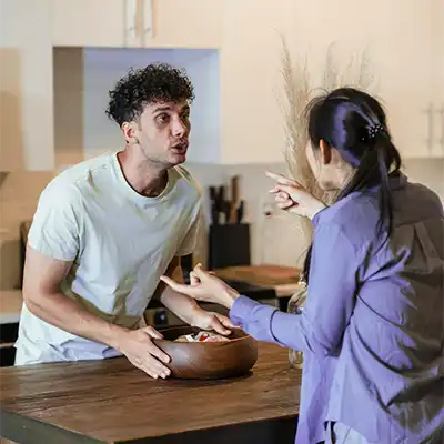 Addiction recovery and relationships, a couple arguing.