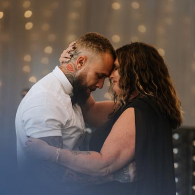  Couple crying needing addiction treatment.